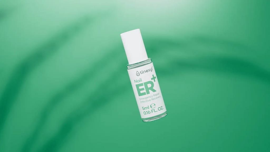 Nail ER+ bottle on a soft green background